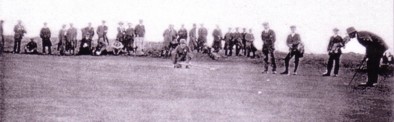 A vintage golf photo of Edward Ray putting in the 1912 British Open Championship.