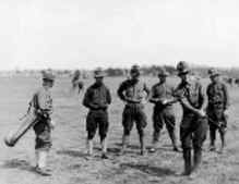 A vintage photo of Francis Ouimet putting on a golfing exhibition while in the Army.