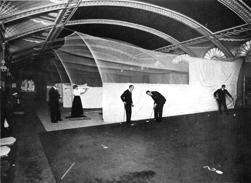 A vintage photo of the indoor golf school at The Ritz in NYC, circa 1913