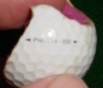 A photo of a broken golf ball - view 3