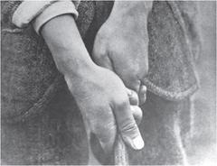 A photo of Harry Vardon's golf grip.