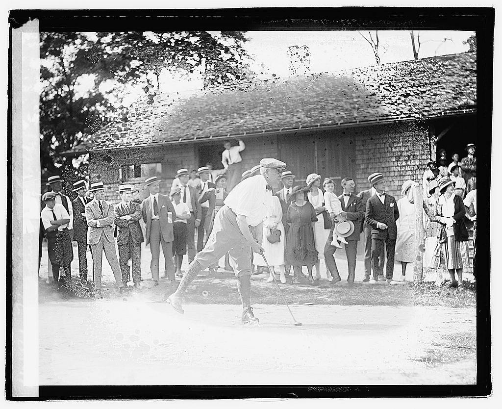 President Harding playing golf.