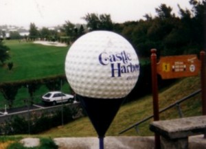A photo of the giant golf ball at Castle Harbor's first tee.