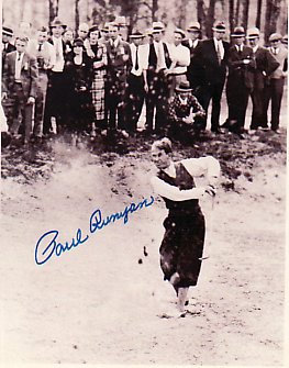 A photo of Paul Runyan making one of his famous sand trap shots.