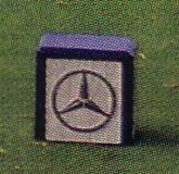 Mercedes Benz logo on a tournament tee marker.